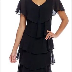 Brand new never worn elegant black cocktail dress